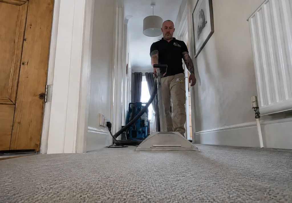 Professional carpet cleaning service inside a residential property